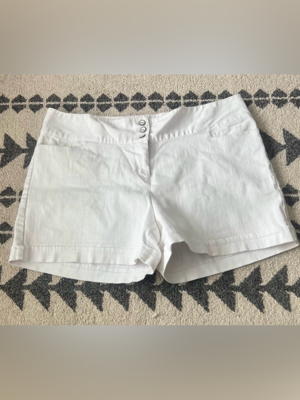 Maurice’s white shorts